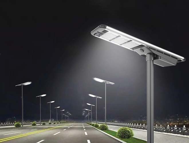 Solar-powered street light lining an outdoor walkway